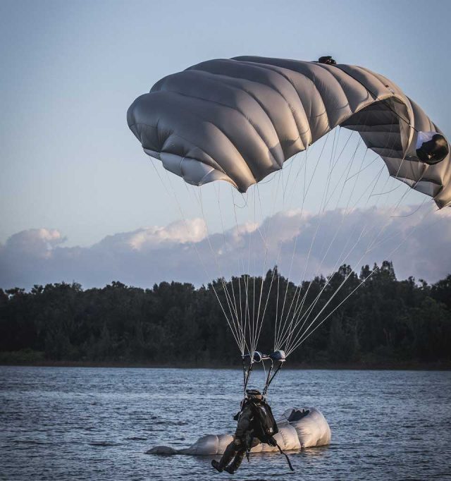 Military jumper beneath the Military Silhouette canopy preparing for an intentional water landing