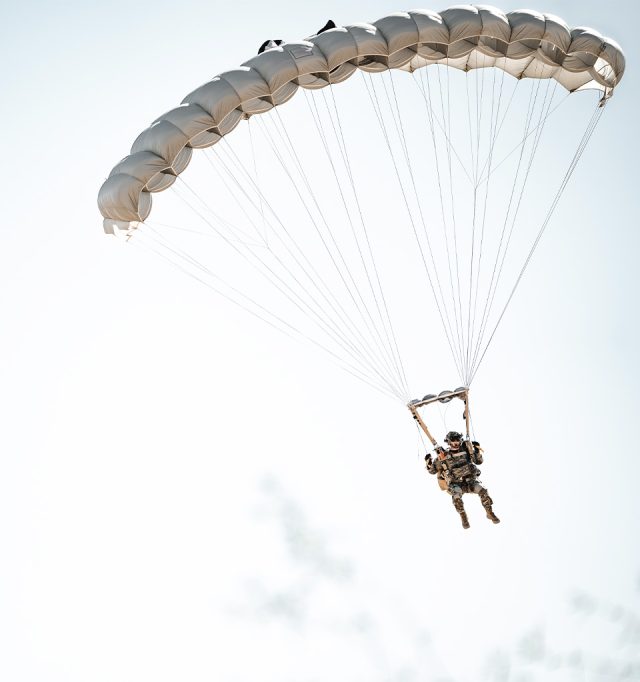 Jumper in fatigues flying Military Silhouette